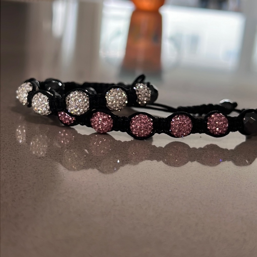 Sold as a set. Swarovski adjustable bracelets